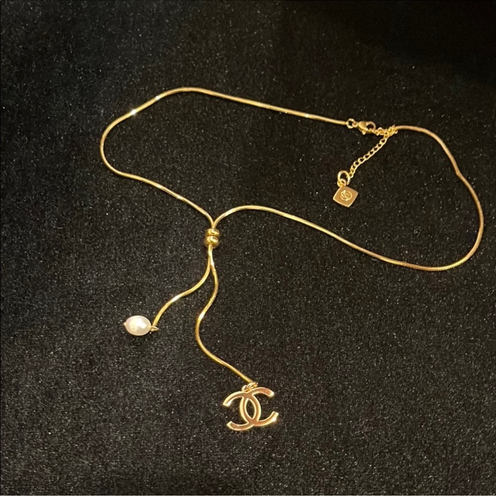 CHANEL Gold Necklace with Pearl and Logo Charm - Picture 7 of 10
